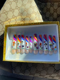 Powerpuff Girls rainbow coffin press-on nail set with character art and rhinestone accents